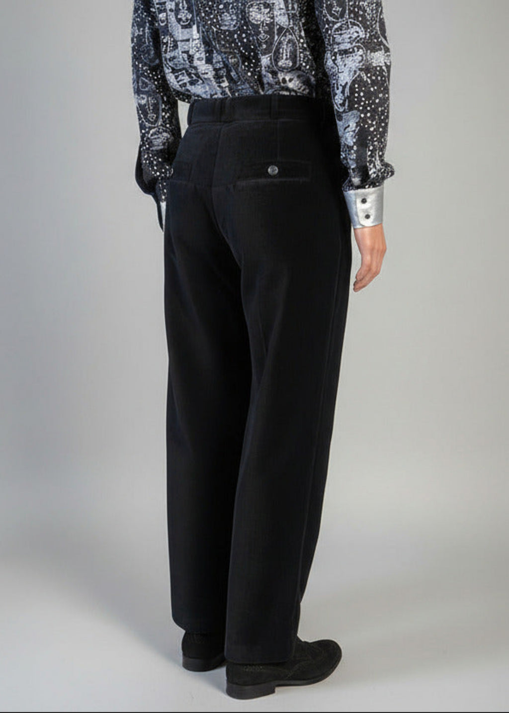 Stacy Stewart Smith Men's Suede Pleated Windsor Pants on a mannequin 6'3" back view. 