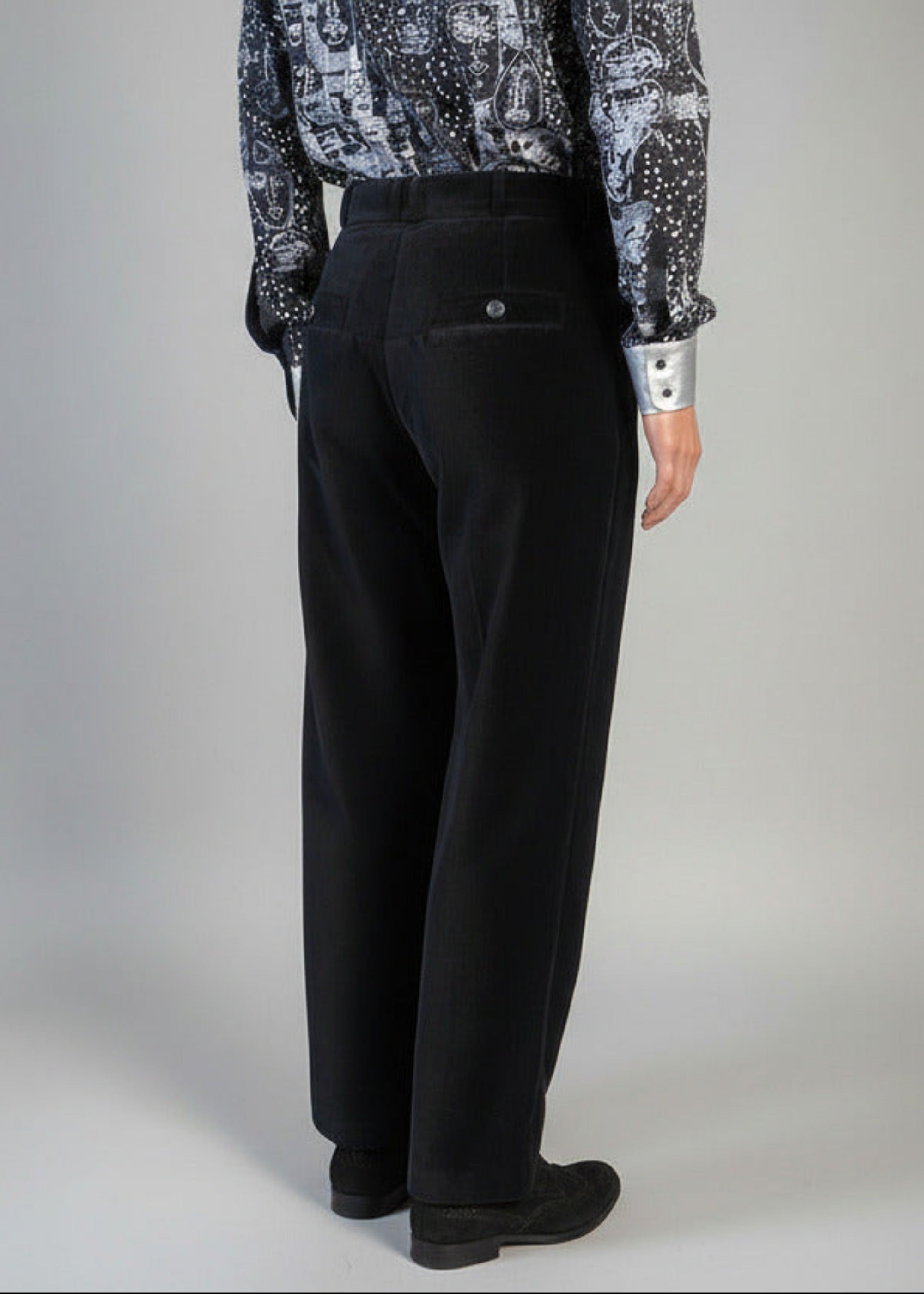 Stacy Stewart Smith Men's Suede Pleated Windsor Pants on a mannequin 6'3" back view. 