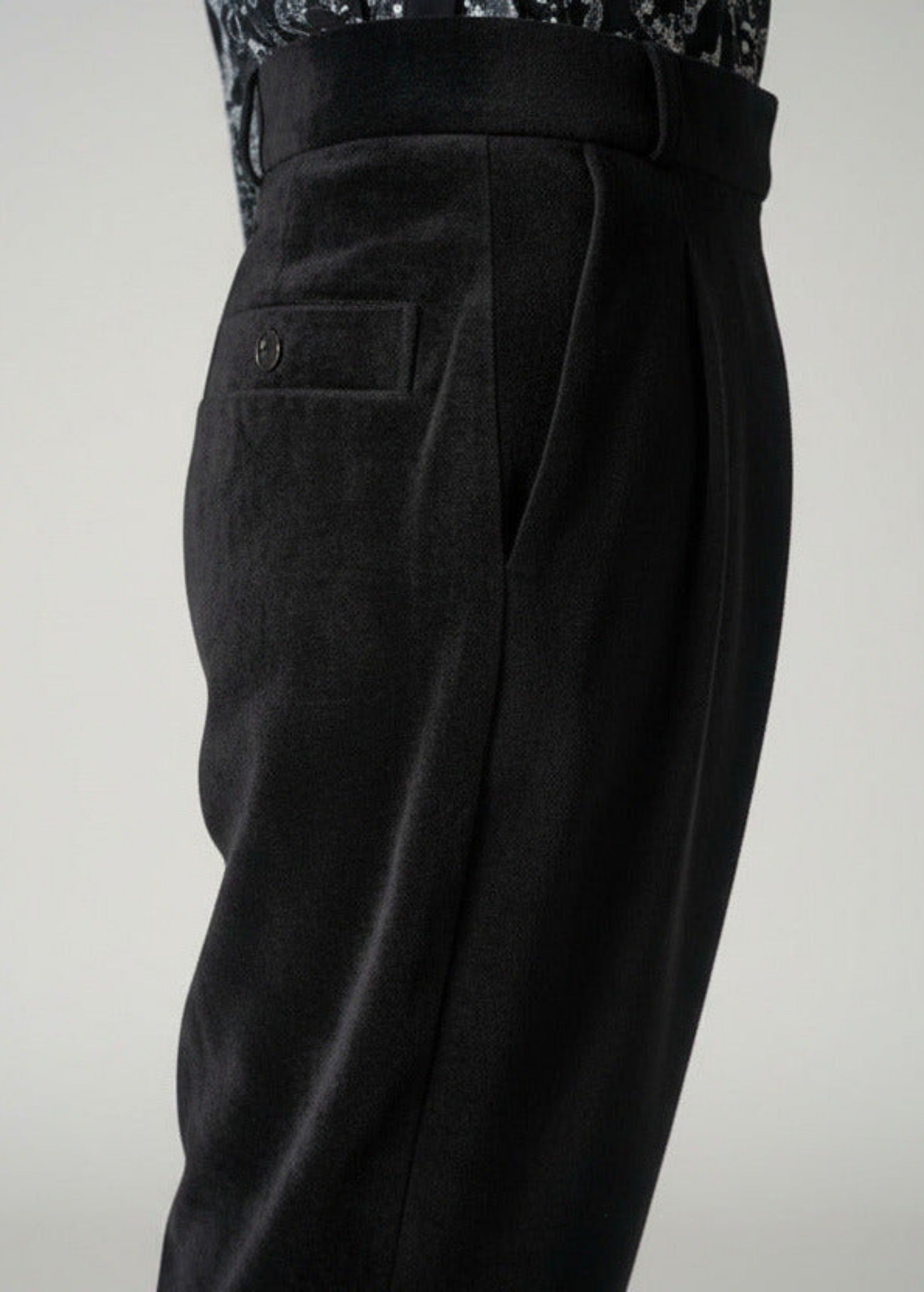 Stacy Stewart Smith Men's Suede Pleated Windsor Pants on a mannequin 6'3" zoomed side view. 
